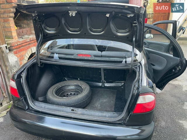 Чорний Деу Ланос, об'ємом двигуна 1.5 л та пробігом 100 тис. км за 3000 $, фото 11 на Automoto.ua