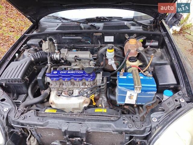Черный Дэу Ланос, объемом двигателя 1.5 л и пробегом 180 тыс. км за 2300 $, фото 17 на Automoto.ua