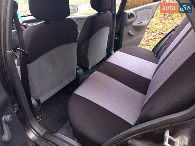 Черный Дэу Ланос, объемом двигателя 1.5 л и пробегом 180 тыс. км за 2300 $, фото 4 на Automoto.ua