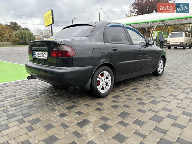 Черный Дэу Ланос, объемом двигателя 1.6 л и пробегом 270 тыс. км за 2900 $, фото 7 на Automoto.ua