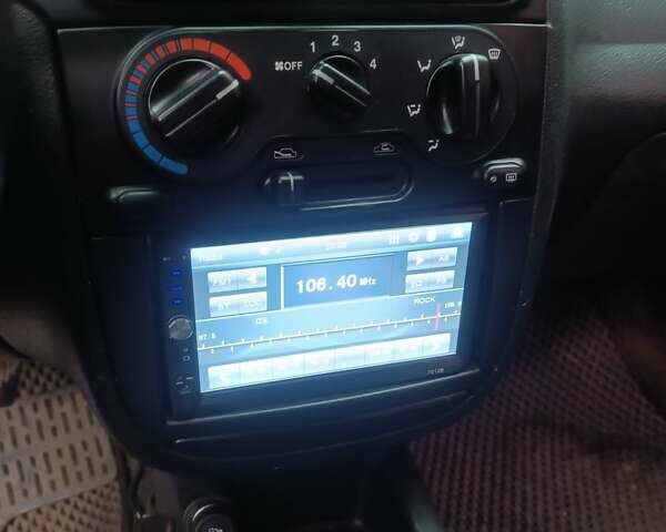 Чорний Деу Ланос, об'ємом двигуна 1.39 л та пробігом 170 тис. км за 2500 $, фото 12 на Automoto.ua