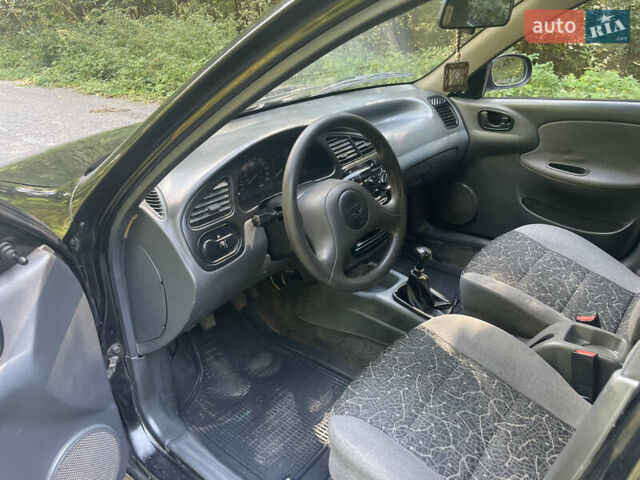 Чорний Деу Ланос, об'ємом двигуна 1.5 л та пробігом 157 тис. км за 2350 $, фото 14 на Automoto.ua