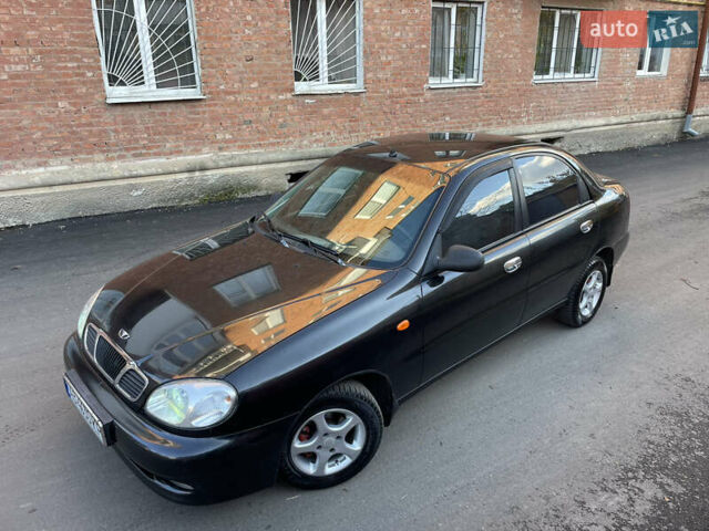 Черный Дэу Ланос, объемом двигателя 1.4 л и пробегом 233 тыс. км за 2500 $, фото 13 на Automoto.ua