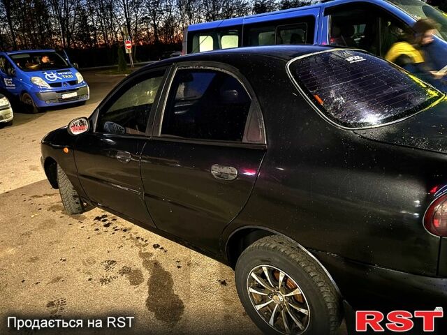 Черный Дэу Ланос, объемом двигателя 1.5 л и пробегом 292 тыс. км за 2300 $, фото 2 на Automoto.ua