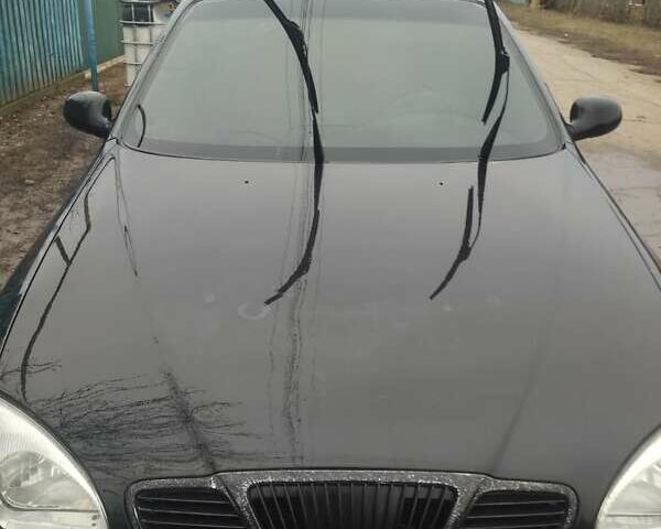 Чорний Деу Ланос, об'ємом двигуна 1.5 л та пробігом 220 тис. км за 2000 $, фото 2 на Automoto.ua