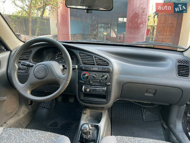 Чорний Деу Ланос, об'ємом двигуна 1.5 л та пробігом 100 тис. км за 3000 $, фото 15 на Automoto.ua