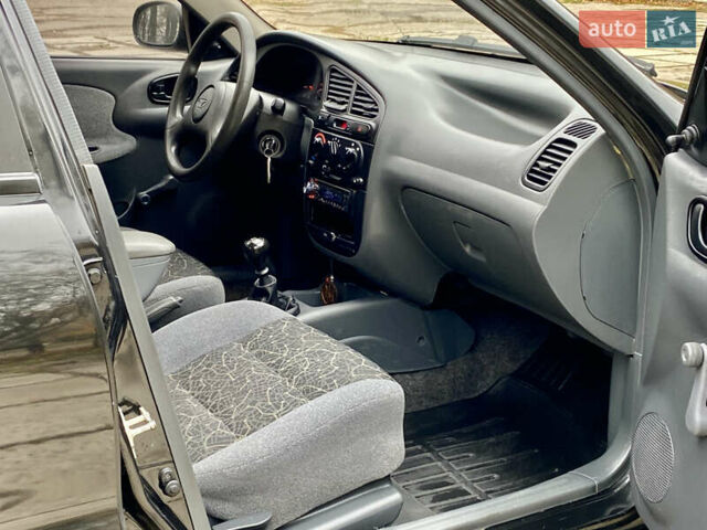 Чорний Деу Ланос, об'ємом двигуна 1.5 л та пробігом 198 тис. км за 2600 $, фото 27 на Automoto.ua
