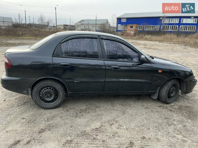 Черный Дэу Ланос, объемом двигателя 1.5 л и пробегом 219 тыс. км за 2300 $, фото 2 на Automoto.ua