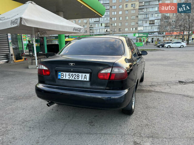 Черный Дэу Ланос, объемом двигателя 1.5 л и пробегом 319 тыс. км за 2400 $, фото 7 на Automoto.ua