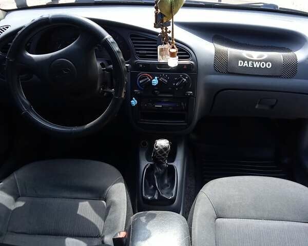 Черный Дэу Ланос, объемом двигателя 1.5 л и пробегом 170 тыс. км за 2850 $, фото 13 на Automoto.ua