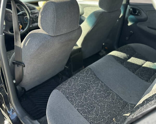 Чорний Деу Ланос, об'ємом двигуна 1.5 л та пробігом 150 тис. км за 1850 $, фото 2 на Automoto.ua