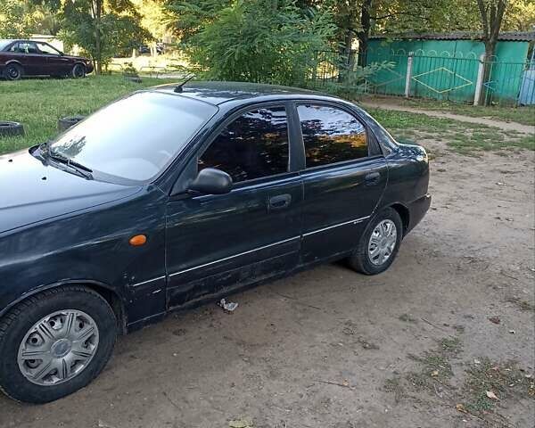 Черный Дэу Ланос, объемом двигателя 1.5 л и пробегом 233 тыс. км за 1600 $, фото 6 на Automoto.ua