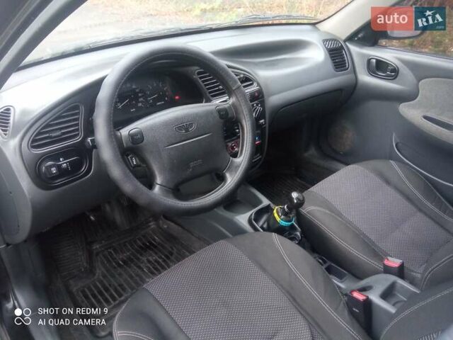 Чорний Деу Ланос, об'ємом двигуна 1.6 л та пробігом 230 тис. км за 1750 $, фото 3 на Automoto.ua