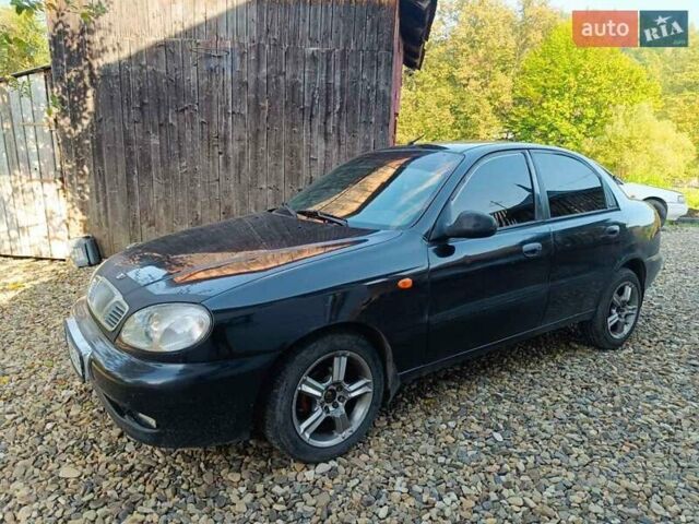 Чорний Деу Ланос, об'ємом двигуна 1.5 л та пробігом 200 тис. км за 1999 $, фото 1 на Automoto.ua