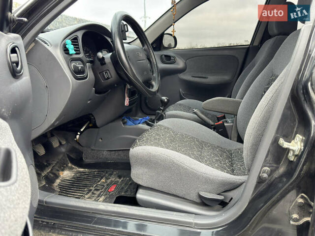 Чорний Деу Ланос, об'ємом двигуна 1.6 л та пробігом 40 тис. км за 3900 $, фото 6 на Automoto.ua