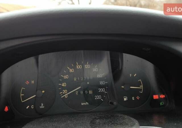 Черный Дэу Ланос, объемом двигателя 1.39 л и пробегом 213 тыс. км за 2300 $, фото 6 на Automoto.ua