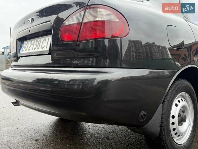 Черный Дэу Ланос, объемом двигателя 1.5 л и пробегом 128 тыс. км за 2999 $, фото 24 на Automoto.ua