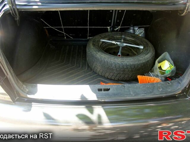 Черный Дэу Ланос, объемом двигателя 1.6 л и пробегом 104 тыс. км за 3000 $, фото 5 на Automoto.ua