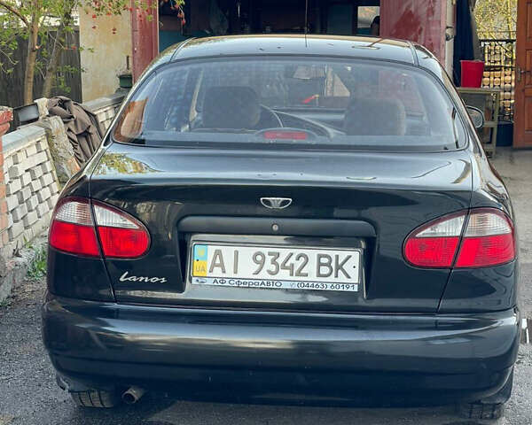 Чорний Деу Ланос, об'ємом двигуна 1.5 л та пробігом 100 тис. км за 3000 $, фото 3 на Automoto.ua