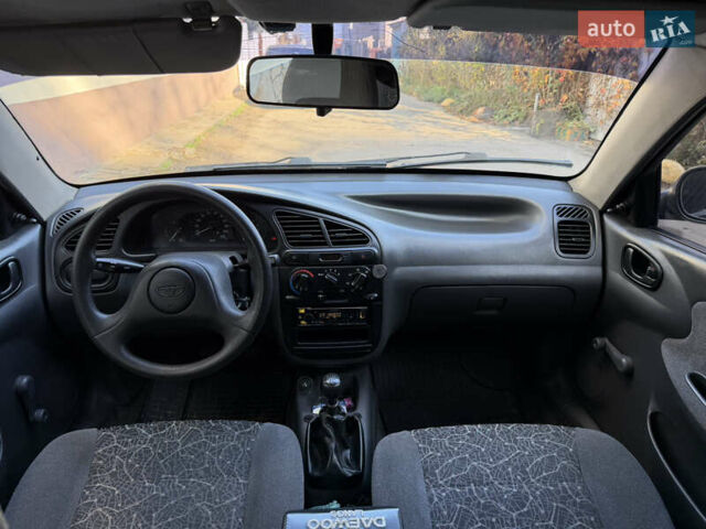 Черный Дэу Ланос, объемом двигателя 1.5 л и пробегом 100 тыс. км за 2900 $, фото 21 на Automoto.ua