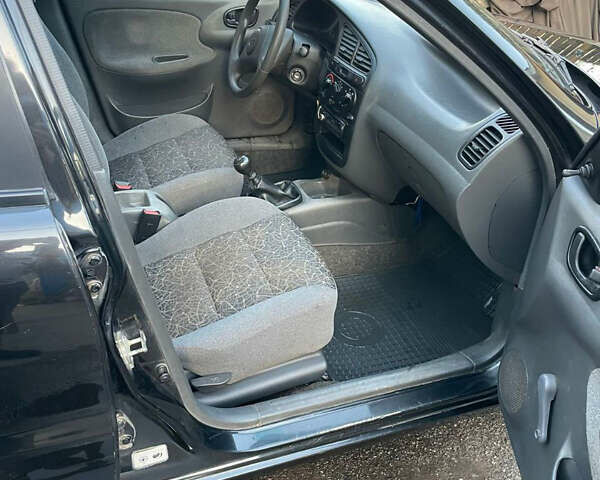 Чорний Деу Ланос, об'ємом двигуна 1.5 л та пробігом 100 тис. км за 3000 $, фото 8 на Automoto.ua