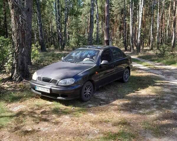 Черный Дэу Ланос, объемом двигателя 1.5 л и пробегом 180 тыс. км за 2250 $, фото 1 на Automoto.ua