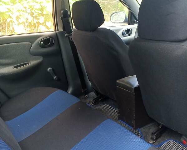 Черный Дэу Ланос, объемом двигателя 1.6 л и пробегом 239 тыс. км за 3200 $, фото 4 на Automoto.ua