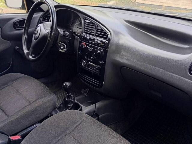 Черный Дэу Ланос, объемом двигателя 1.5 л и пробегом 171 тыс. км за 1600 $, фото 5 на Automoto.ua