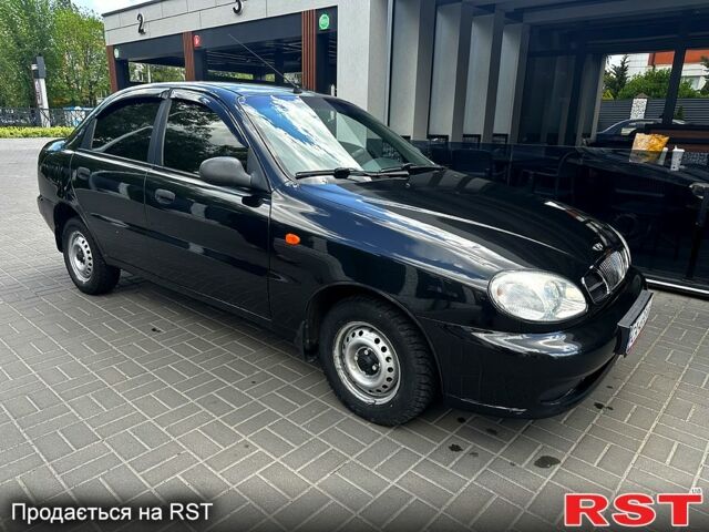 Черный Дэу Ланос, объемом двигателя 1.6 л и пробегом 120 тыс. км за 3000 $, фото 1 на Automoto.ua