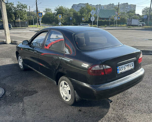 Чорний Деу Ланос, об'ємом двигуна 1.5 л та пробігом 350 тис. км за 1700 $, фото 3 на Automoto.ua