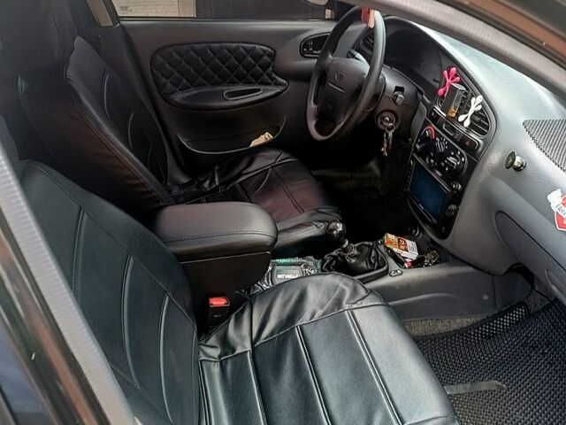 Черный Дэу Ланос, объемом двигателя 1.5 л и пробегом 173 тыс. км за 3200 $, фото 3 на Automoto.ua