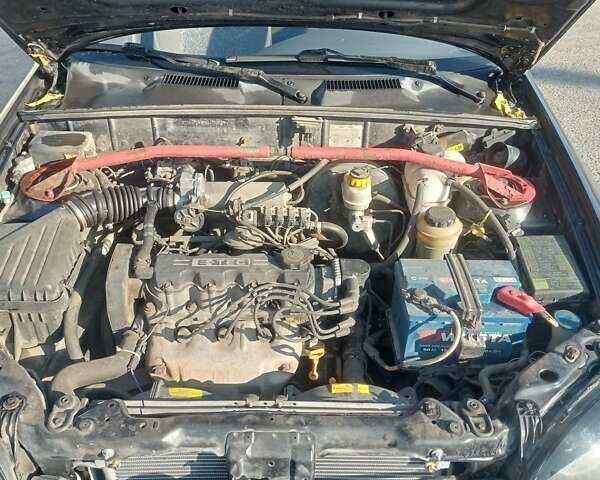 Чорний Деу Ланос, об'ємом двигуна 1.5 л та пробігом 184 тис. км за 3000 $, фото 7 на Automoto.ua