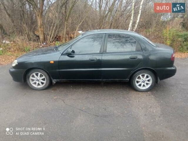 Чорний Деу Ланос, об'ємом двигуна 1.6 л та пробігом 230 тис. км за 1750 $, фото 4 на Automoto.ua