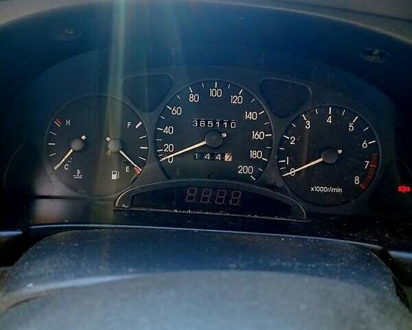 Черный Дэу Ланос, объемом двигателя 1.5 л и пробегом 365 тыс. км за 2000 $, фото 5 на Automoto.ua