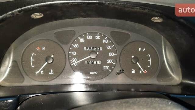 Чорний Деу Ланос, об'ємом двигуна 1.5 л та пробігом 450 тис. км за 1750 $, фото 6 на Automoto.ua