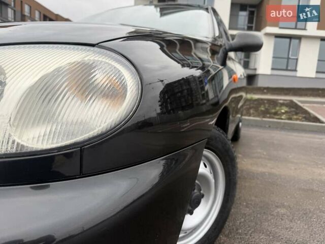 Черный Дэу Ланос, объемом двигателя 1.5 л и пробегом 128 тыс. км за 2999 $, фото 9 на Automoto.ua