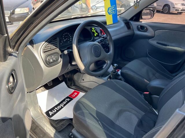 Черный Дэу Ланос, объемом двигателя 1.5 л и пробегом 209 тыс. км за 3490 $, фото 3 на Automoto.ua