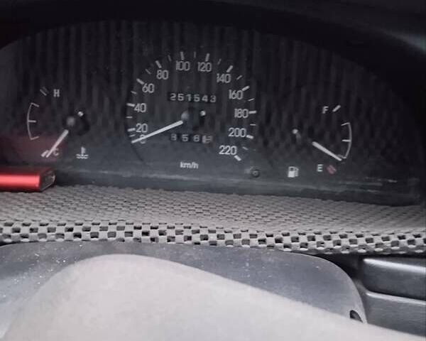 Черный Дэу Ланос, объемом двигателя 1.5 л и пробегом 250 тыс. км за 1700 $, фото 2 на Automoto.ua
