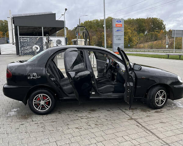 Черный Дэу Ланос, объемом двигателя 1.5 л и пробегом 130 тыс. км за 2300 $, фото 4 на Automoto.ua