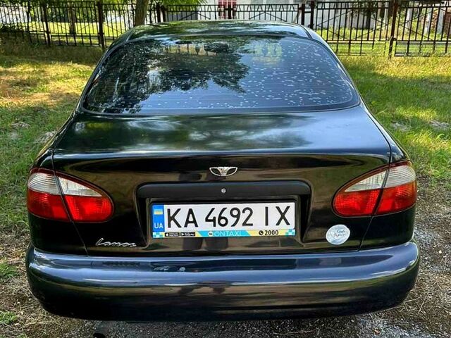 Черный Дэу Ланос, объемом двигателя 1.4 л и пробегом 250 тыс. км за 1999 $, фото 8 на Automoto.ua