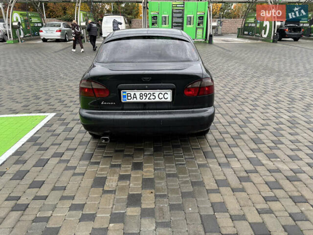 Черный Дэу Ланос, объемом двигателя 1.6 л и пробегом 270 тыс. км за 2900 $, фото 8 на Automoto.ua