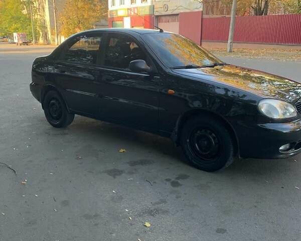 Чорний Деу Ланос, об'ємом двигуна 1.5 л та пробігом 245 тис. км за 3100 $, фото 2 на Automoto.ua