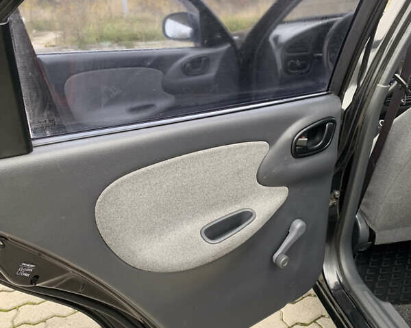 Чорний Деу Ланос, об'ємом двигуна 1.5 л та пробігом 180 тис. км за 2650 $, фото 18 на Automoto.ua