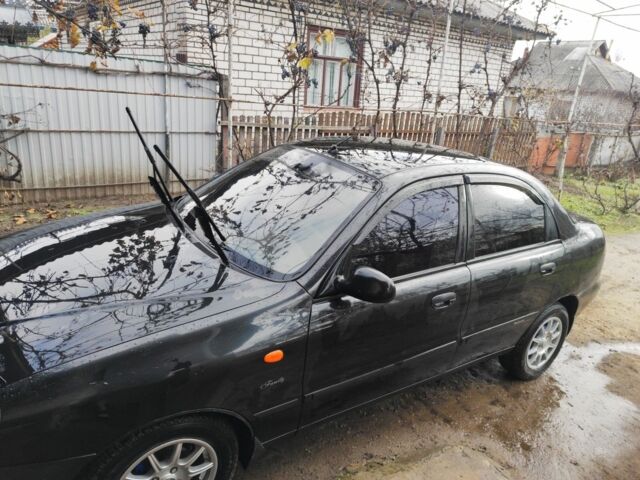 Черный Дэу Ланос, объемом двигателя 1.5 л и пробегом 130 тыс. км за 2700 $, фото 1 на Automoto.ua