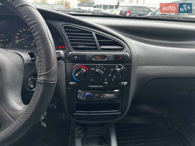 Чорний Деу Ланос, об'ємом двигуна 1.5 л та пробігом 246 тис. км за 2300 $, фото 8 на Automoto.ua