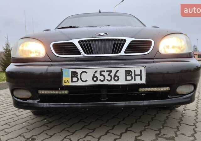 Черный Дэу Ланос, объемом двигателя 1.39 л и пробегом 213 тыс. км за 2300 $, фото 1 на Automoto.ua