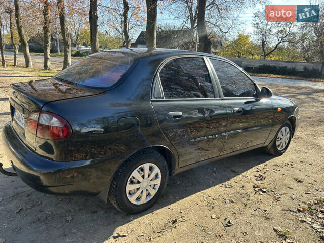 Черный Дэу Ланос, объемом двигателя 1.5 л и пробегом 152 тыс. км за 1550 $, фото 2 на Automoto.ua