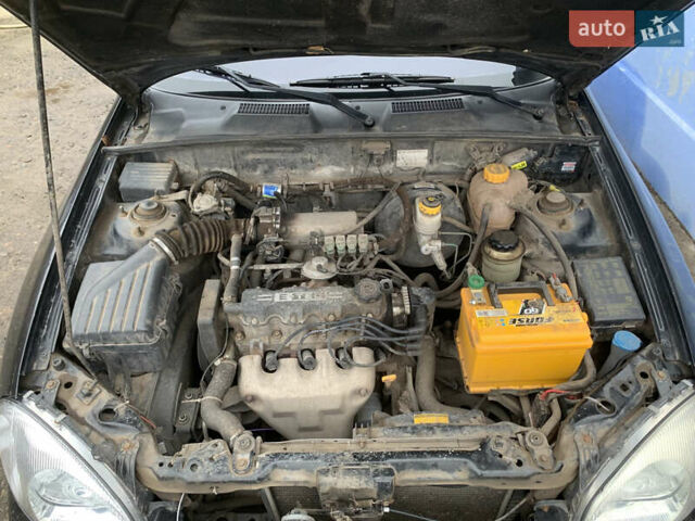 Черный Дэу Ланос, объемом двигателя 1.5 л и пробегом 119 тыс. км за 2700 $, фото 3 на Automoto.ua