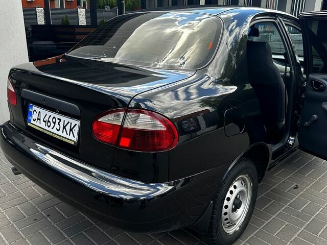 Черный Дэу Ланос, объемом двигателя 1.6 л и пробегом 120 тыс. км за 3000 $, фото 2 на Automoto.ua