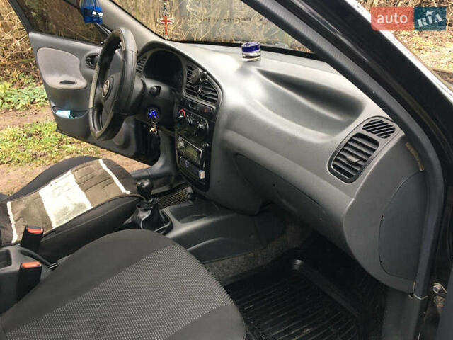 Черный Дэу Ланос, объемом двигателя 1.5 л и пробегом 165 тыс. км за 3000 $, фото 15 на Automoto.ua